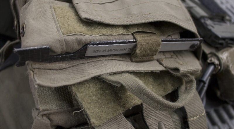 Black Hills Designs - SHOVE-R stowed on the side of a Crye AVS M4 pouch