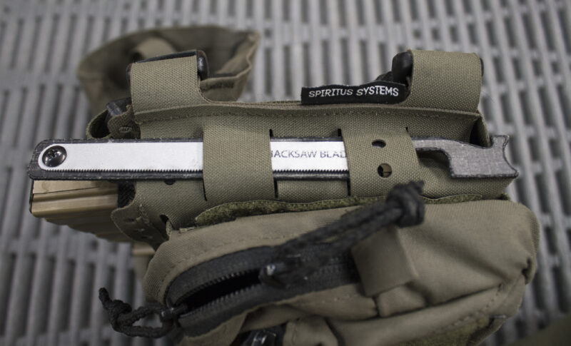 Black Hills Designs - SHOVE-R stowed on the side of a Spiritus Systems Mk5 chest rig