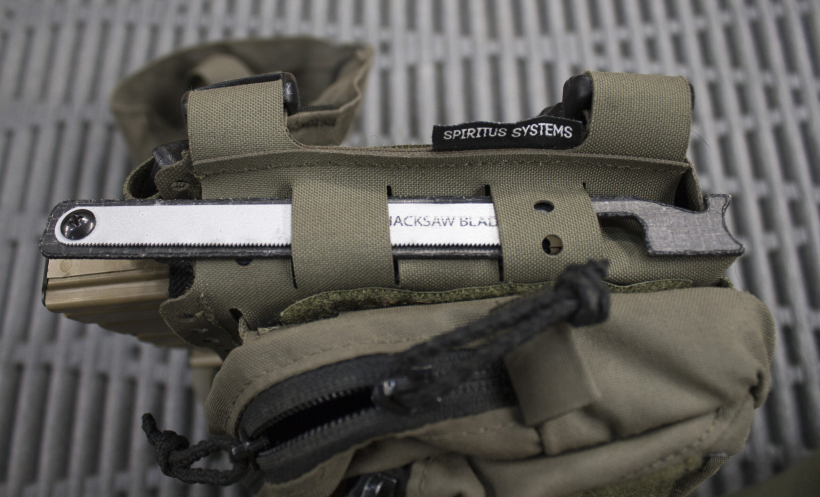 Black Hills Designs - SHOVE-R stowed on the side of a Spiritus Systems Mk5 chest rig